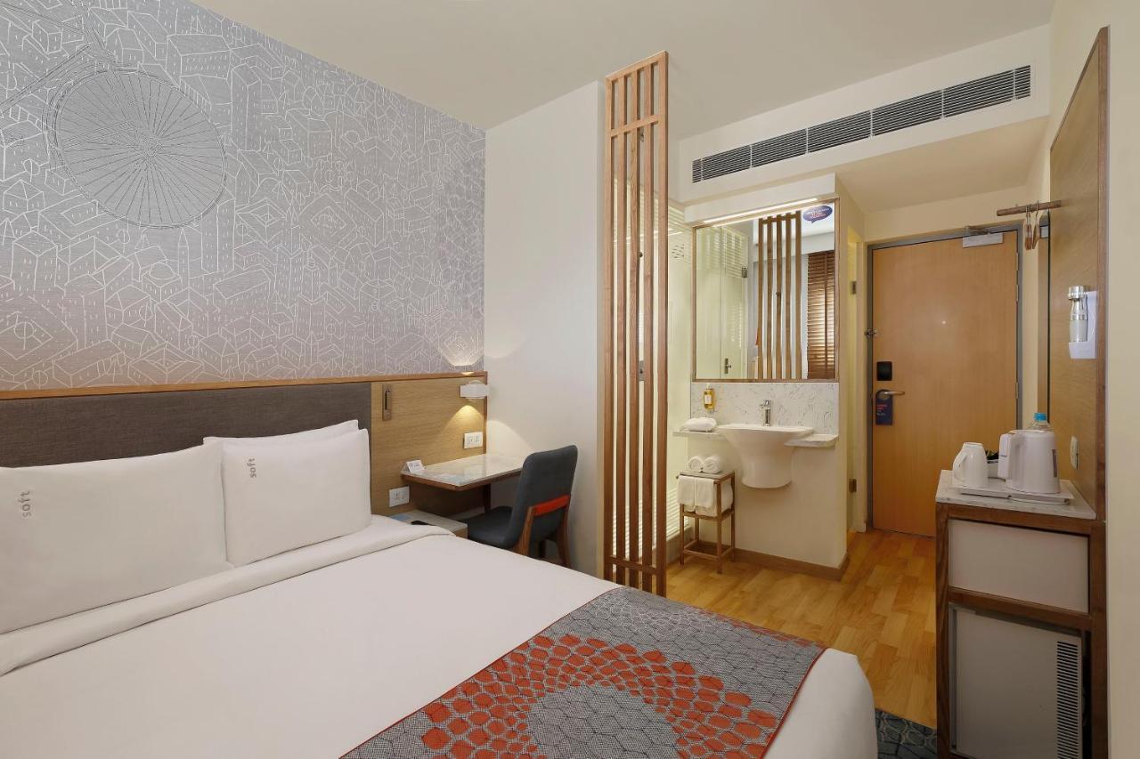 Holiday Inn Express Ahmedabad Prahlad Nagar, an IHG Hotel Exterior foto